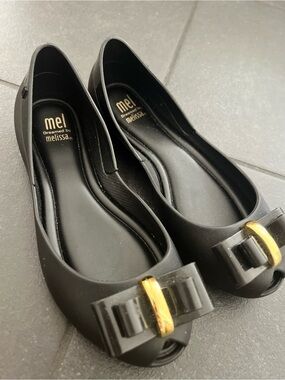 Melissa Black Peep-Toe Flats with Bow and Gold Accent